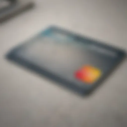 A close-up view of a debit card on a modern financial desk