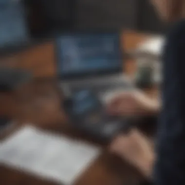 A person analyzing financial documents with a calculator and a laptop